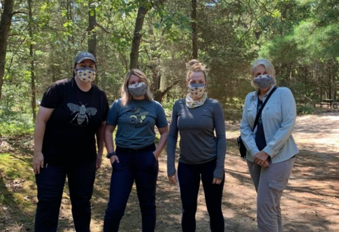 volunteers and staff for bumble bee community science posing for a picture